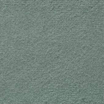 Dusty teal fabric swatch with a dense, granular woven texture and subtle unevenness, presented in diffuse studio lighting.